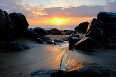 Scenic view of sea against sky during sunset