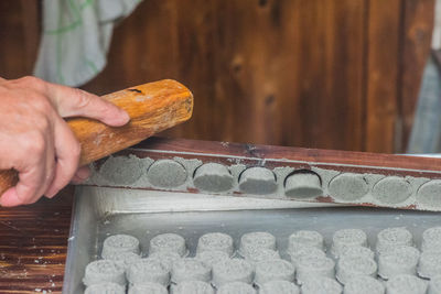 Person working on cutting board