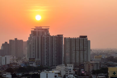 View of cityscape at sunset