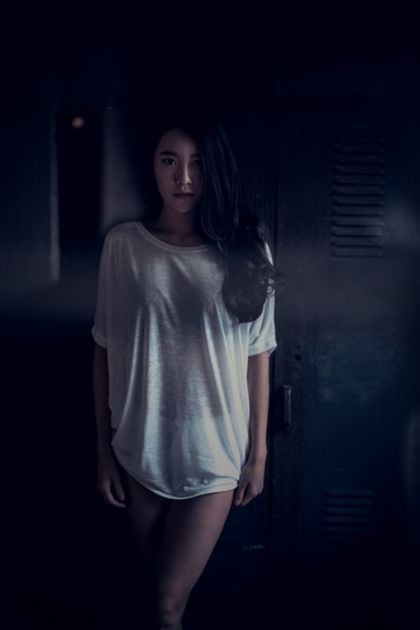 night, one person, young adult, one woman only, only women, beautiful woman, beauty, one young woman only, people, front view, looking at camera, standing, adult, portrait, adults only, spooky, beautiful people, illuminated, indoors, young women, fashion model, halloween