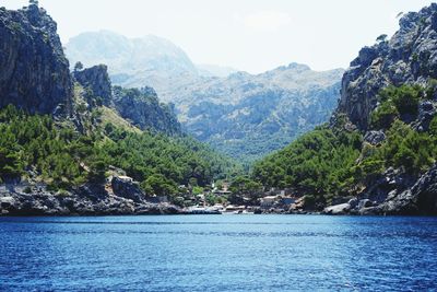 Scenic view of sea with mountains in background