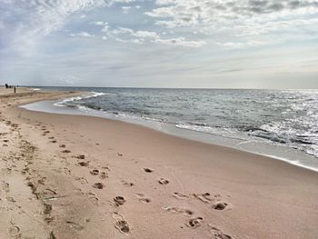 Scenic view of beach against sky