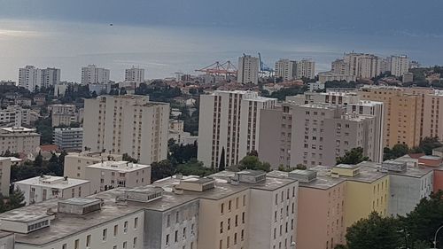 High angle view of buildings against sky