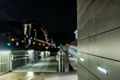 Illuminated city street at night