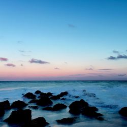 Scenic view of sea at sunset