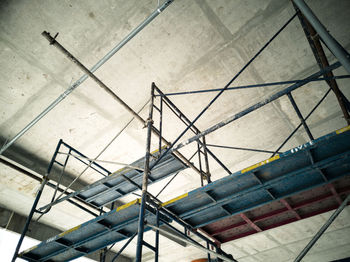 Low angle view of staircase against ceiling