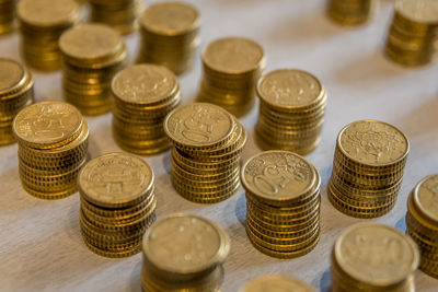 High angle view of coins on table