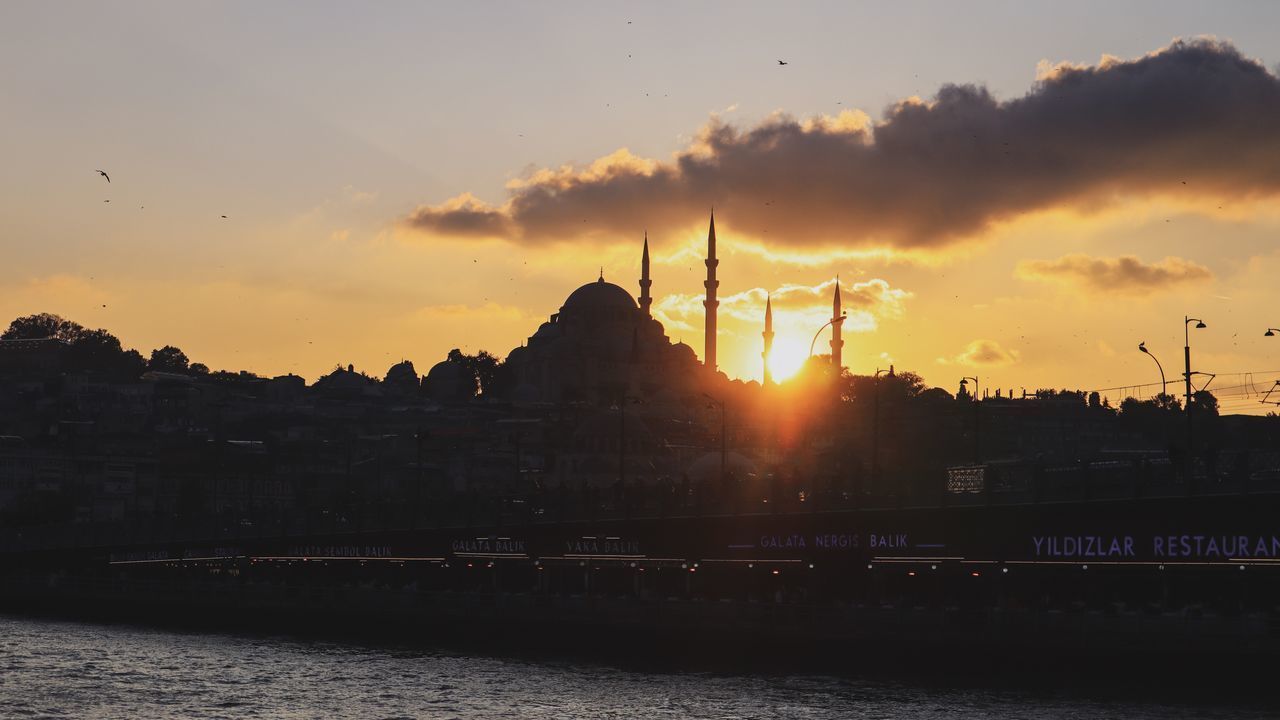 SILHOUETTE OF BUILDINGS DURING SUNSET