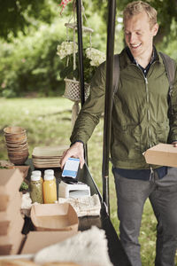 Man paying with cell phone