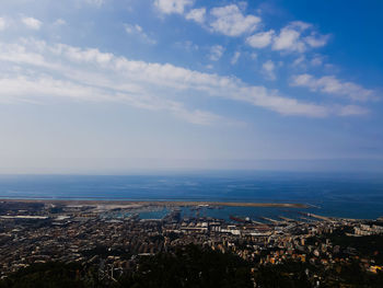 Aerial view of townscape against sky