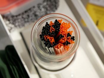 High angle view of orange fruits in bowl on table