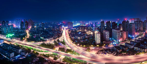 Illuminated cityscape at night