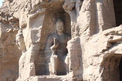 Carvings on stone wall