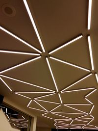 Low angle view of illuminated ceiling