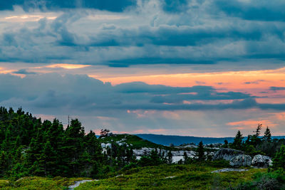 Scenic view of dramatic sky over landscape