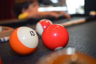 Close-up of multi colored balls on table