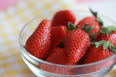 Close-up of strawberries in bowl on table