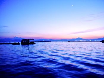 Scenic view of sea at sunset