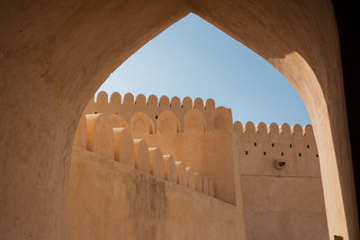 Low angle view of fort against sky