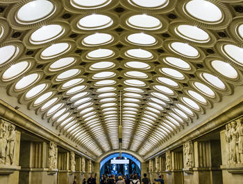 Low angle view of illuminated ceiling of building