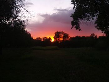 Scenic view of landscape at sunset