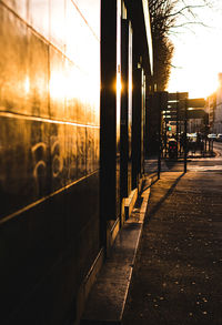 View of city street at sunset