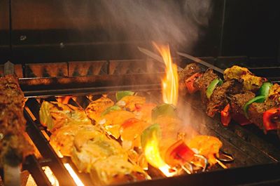 Close-up of meat on barbecue grill