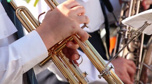 Cropped image of musician playing trumpet