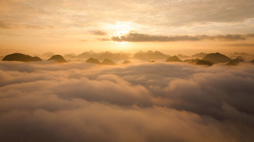 Scenic view of mountains against sky during sunset