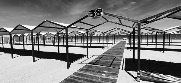 Pier over sea against sky