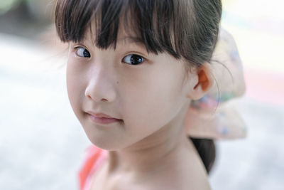 Close-up portrait of cute girl 