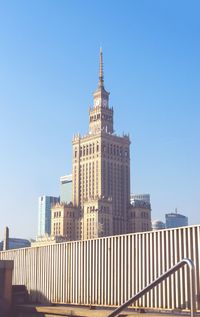 Low angle view of government building against clear blue sky