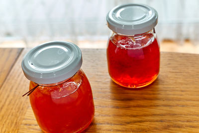 Close-up of homemade jam in glass jar on table