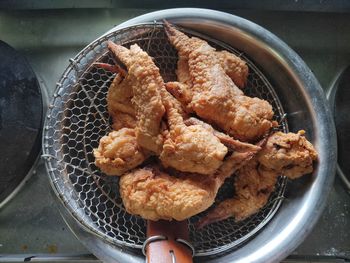 High angle view of meat in cooking pan