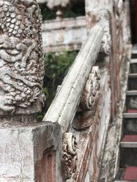 Close-up of weathered railing