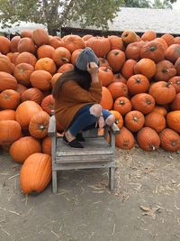 Full frame shot of pumpkins in field