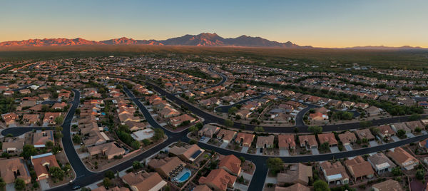 High angle view of townscape against sky during sunset