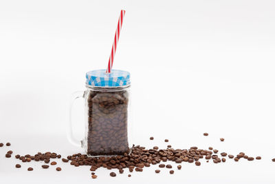 Close-up of coffee cup against white background