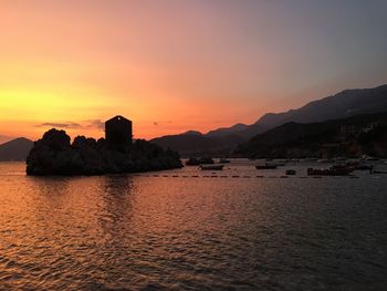 Scenic view of sea against sky during sunset