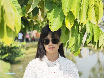 Portrait of woman wearing sunglasses