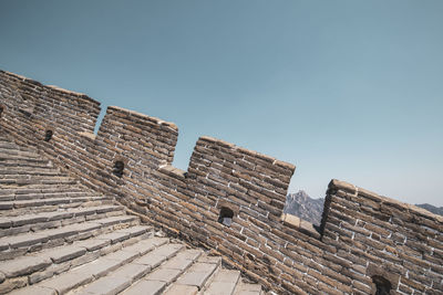 Low angle view of old building against sky