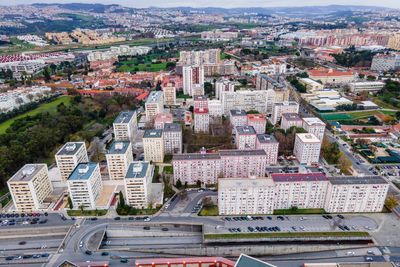 Aerial view of benfica residential district at twilight, view of white building, lisbon, portugal.