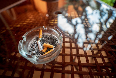 Close-up of cigarette on table