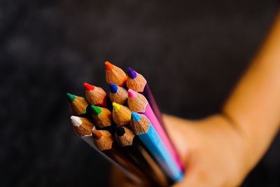 Close-up of multi colored pencils on table