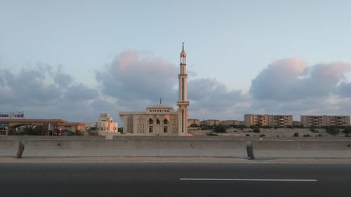 Buildings in city against sky