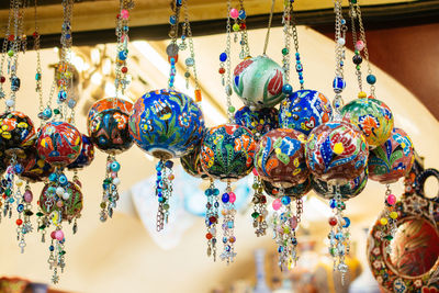 Close-up of decorations for sale in market stall