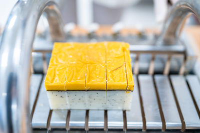 Close-up of yellow organic soap on table