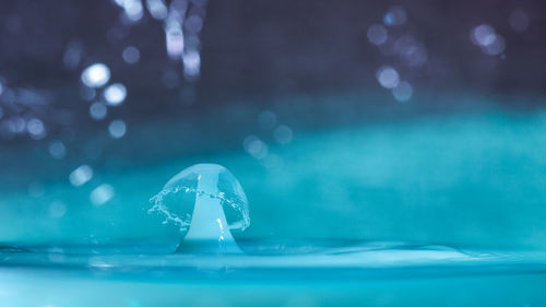 Close-up of water drop on swimming pool