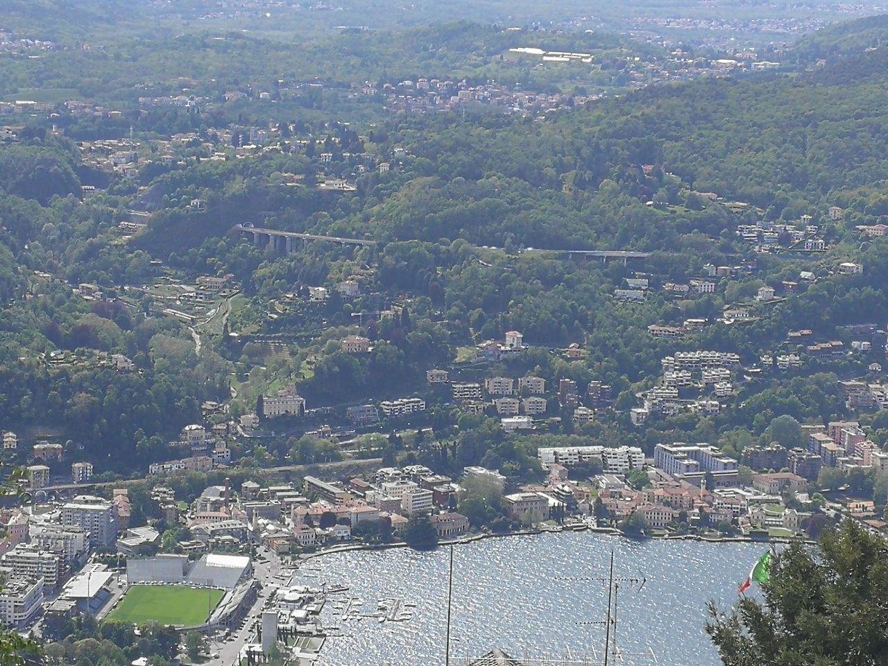 HIGH ANGLE VIEW OF TOWNSCAPE AND TREES IN CITY