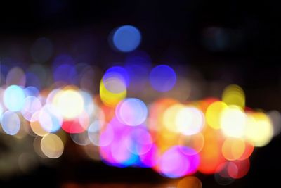 Defocused image of illuminated lights at night